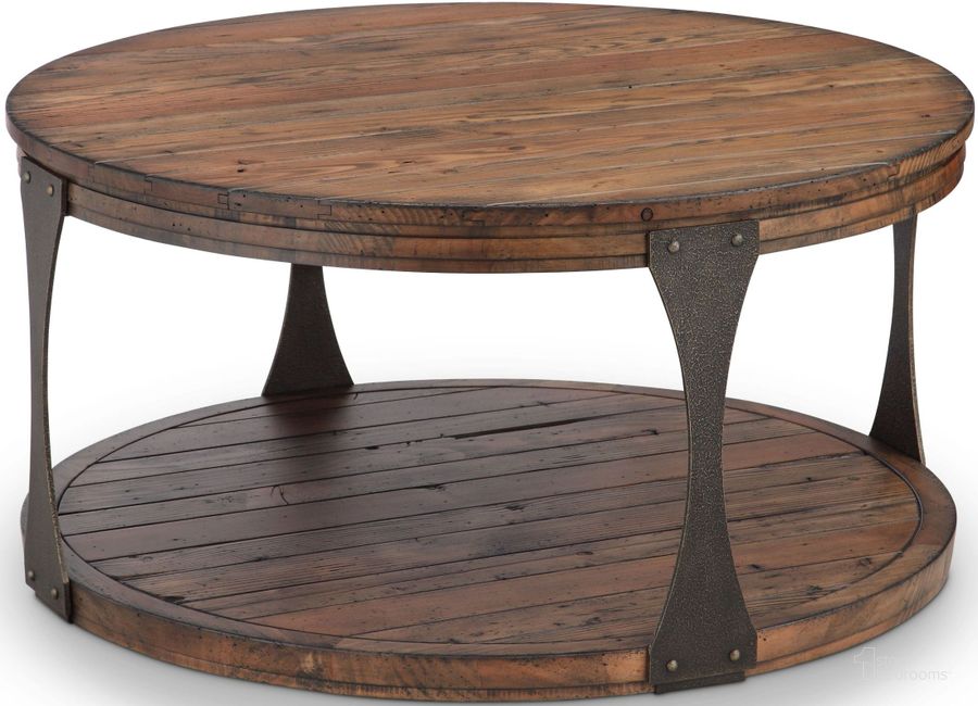 The appearance of Montgomery Bourbon and Aged Iron Round Cocktail Table designed by Magnussen in the industrial interior design. This brown piece of furniture  was selected by 1StopBedrooms from Montgomery Collection to add a touch of cosiness and style into your home. Sku: T4112-45. Table Top Shape: Round. Material: Wood. Product Type: Cocktail Table. Image1