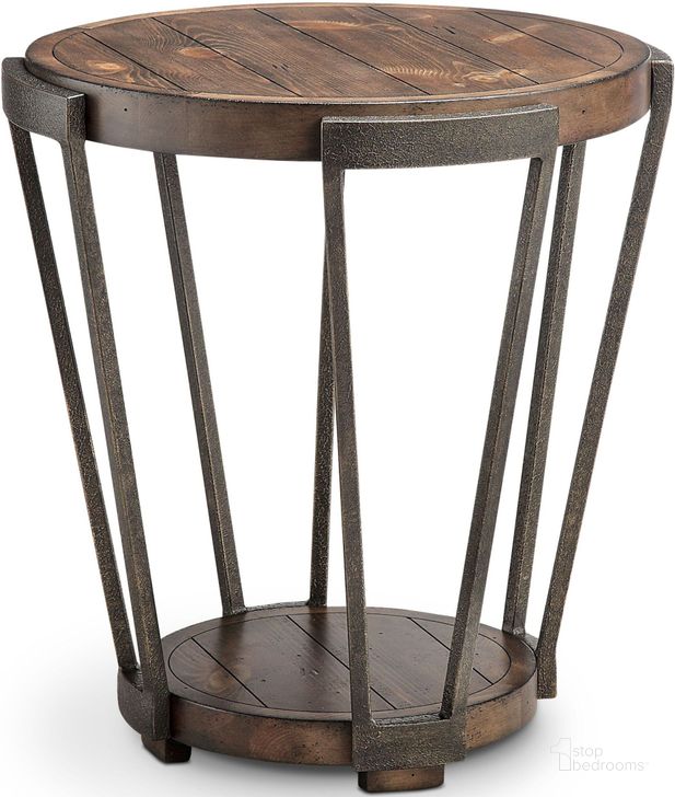 The appearance of Yukon Bourbon and Aged Iron Round End Table designed by Magnussen in the transitional interior design. This brown piece of furniture  was selected by 1StopBedrooms from Yukon Collection to add a touch of cosiness and style into your home. Sku: T4405-05. Table Top Shape: Round. Material: Wood. Product Type: End Table. Image1