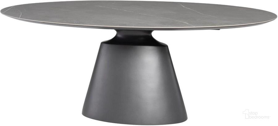 The appearance of Taji Grey Ceramic Dining Table HGNE323 designed by Nuevo in the modern / contemporary interior design. This grey piece of furniture  was selected by 1StopBedrooms from Taji Collection to add a touch of cosiness and style into your home. Sku: HGNE323. Table Base Style: Pedestal. Table Top Shape: Oval. Product Type: Dining Table. Material: Ceramic. Size: 46". Image1