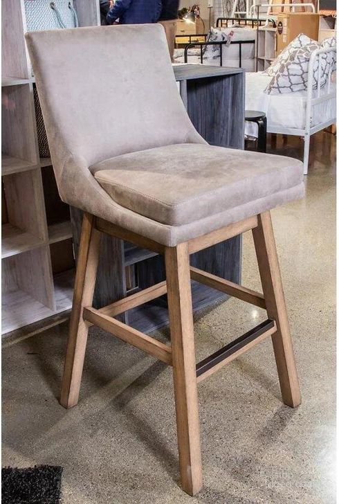 The appearance of Tallenger Beige Tall Upholstered Swivel Barstool Set of 2 designed by Signature Design by Ashley in the transitional interior design. This beige piece of furniture  was selected by 1StopBedrooms from Tallenger Collection to add a touch of cosiness and style into your home. Sku: D380-530. Material: Fabric. Product Type: Barstool. Image1