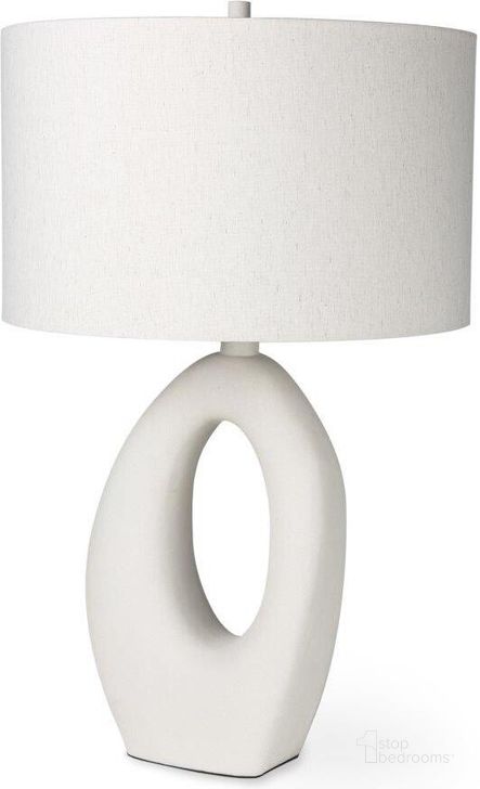 The appearance of Tao Cream Base With White Shade Table Lamp designed by Mercana in the modern / contemporary interior design. This cream piece of furniture  was selected by 1StopBedrooms from Tao Collection to add a touch of cosiness and style into your home. Sku: 69790. Material: Wood. Product Type: Table Lamp. Image1