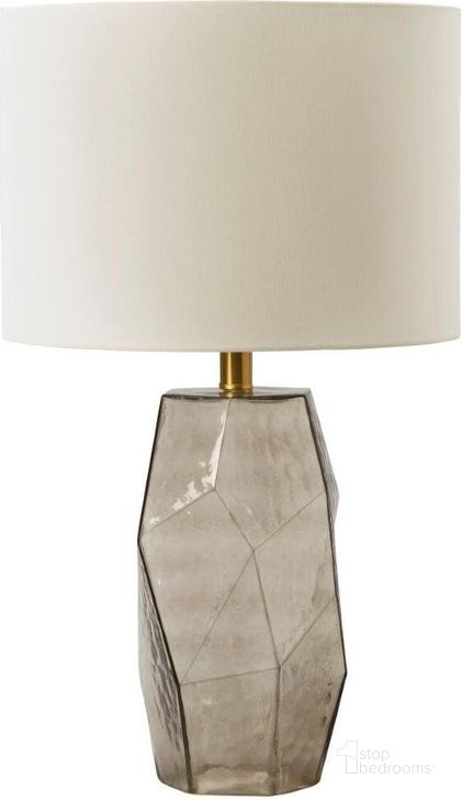 The appearance of Taylow Gray Glass Table Lamp designed by Signature Design by Ashley in the modern / contemporary interior design. This gray piece of furniture  was selected by 1StopBedrooms from Taylow Collection to add a touch of cosiness and style into your home. Sku: L430794. Material: Glass. Product Type: Table Lamp. Image1