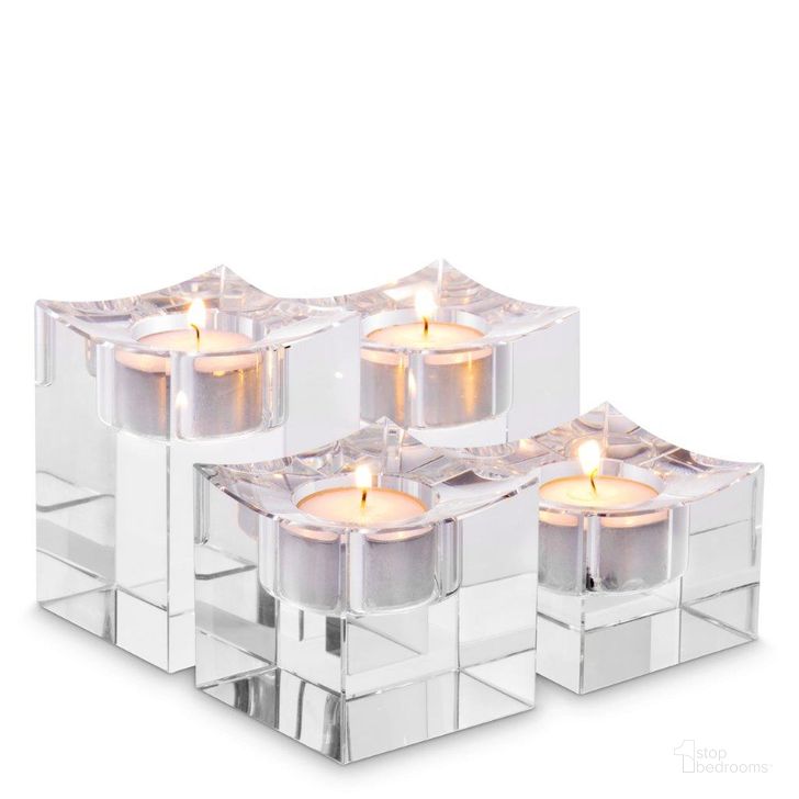 The appearance of Tealight Holder Giancarlo Low Crystal Glass Set Of 4 designed by Eichholtz in the modern / contemporary interior design. This clear piece of furniture  was selected by 1StopBedrooms from Giancarlo Collection to add a touch of cosiness and style into your home. Sku: 116342. Product Type: Candle Holder. Material: Crystal. Image1
