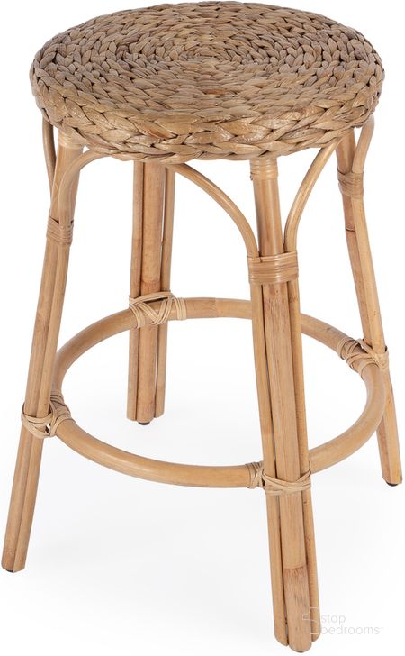 The appearance of Tobias Rattan Round 24 Inch Counter Stool In Light Brown designed by Butler Specialty Company in the transitional interior design. This light brown piece of furniture  was selected by 1StopBedrooms from Tobias Collection to add a touch of cosiness and style into your home. Sku: 9371440. Material: Rattan. Product Type: Barstool. Image1