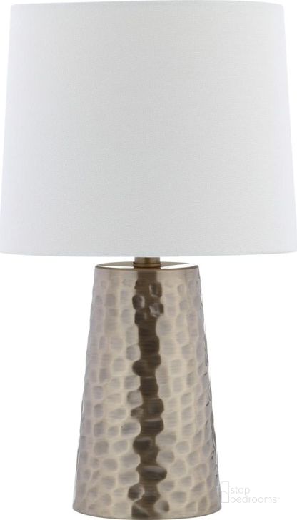 The appearance of Torence Plated Gold Table Lamp designed by Safavieh in the modern / contemporary interior design. This gold piece of furniture  was selected by 1StopBedrooms from Safavieh TBL Collection to add a touch of cosiness and style into your home. Sku: TBL4088A. Product Type: Table Lamp. Material: Brass. Image1