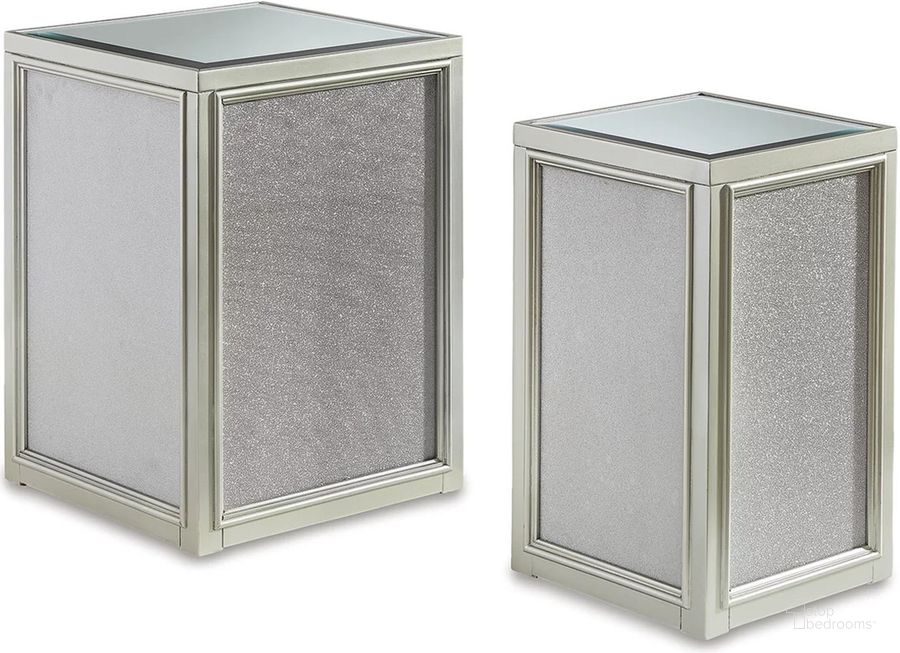 The appearance of Traleena Silver Finish Nesting End Tables (2/Cn) designed by Signature Design by Ashley in the modern / contemporary interior design. This silver piece of furniture  was selected by 1StopBedrooms from Traleena Collection to add a touch of cosiness and style into your home. Sku: T957-16. Material: Glass. Product Type: End Table. Image1