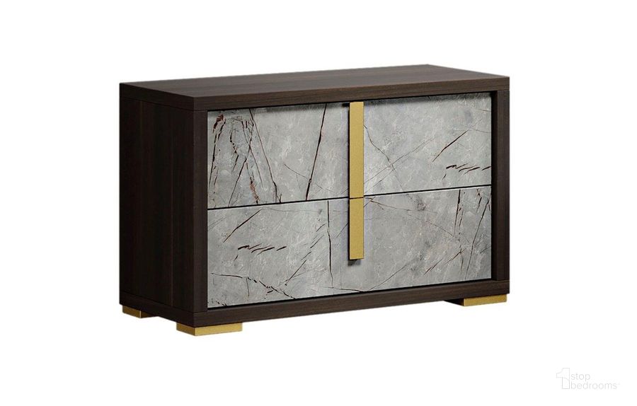 The appearance of Travertine Night Stand In Dark Oak And Gray designed by J&M in the modern / contemporary interior design. This grey and oak piece of furniture  was selected by 1StopBedrooms from Travertine Collection to add a touch of cosiness and style into your home. Sku: 18772-NS. Product Type: Nightstand. Material: MDF. Image1