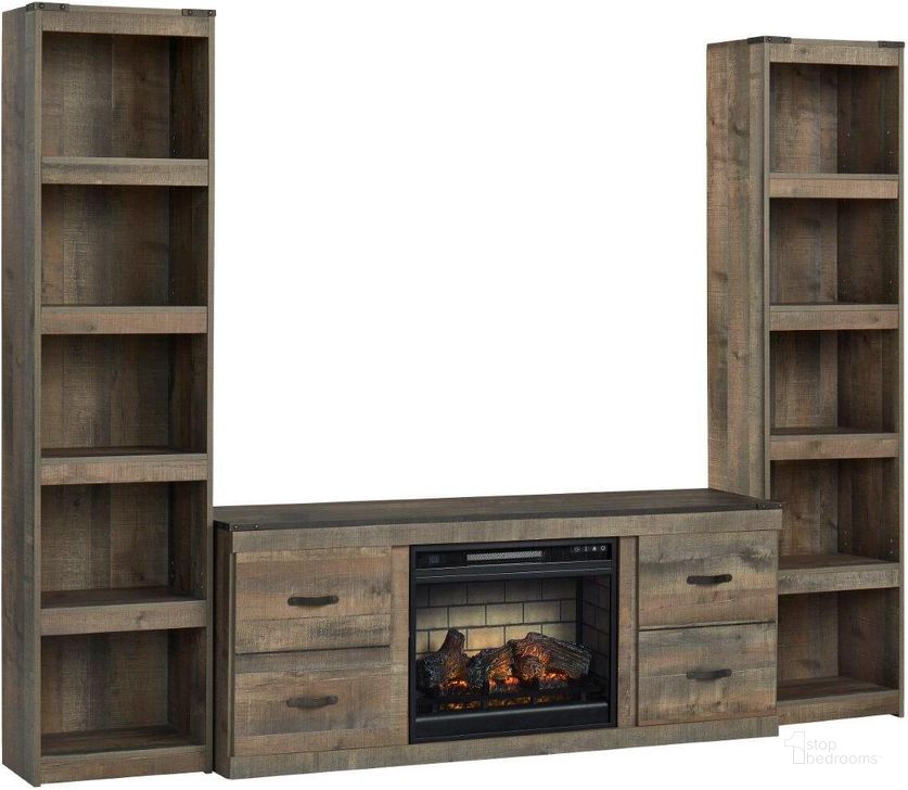 The appearance of Trinell Rustic Brown 3 Piece Entertainment Center with Electric Fireplace designed by Signature Design by Ashley in the rustic / southwestern interior design. This brown piece of furniture  was selected by 1StopBedrooms from Trinell Collection to add a touch of cosiness and style into your home. Sku: EW0446-268;EW0446-124;EW0446-124;W100-101. Material: Wood. Product Type: Entertainment Centers and Wall. Image1