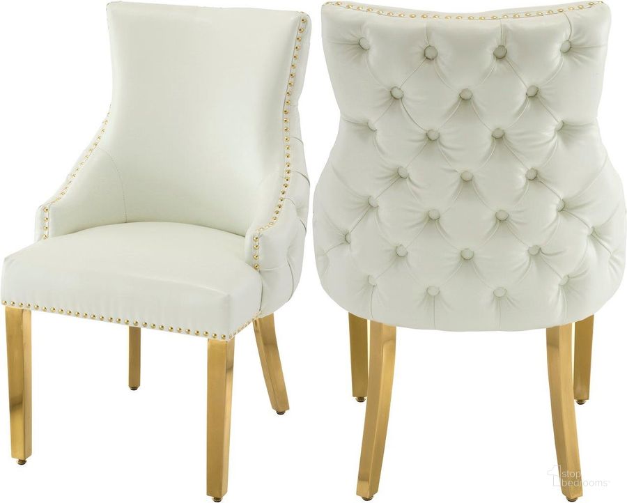 The appearance of Tuft White Faux Leather Dining Chair Set of 2 designed by Meridian in the modern / contemporary interior design. This white piece of furniture  was selected by 1StopBedrooms from Tuft Collection to add a touch of cosiness and style into your home. Sku: 730White-C. Product Type: Dining Chair. Material: Stainless Steel. Image1