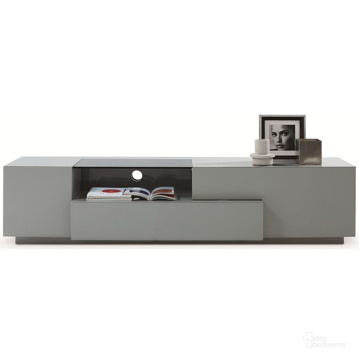 The appearance of TV Stand 015 in Grey High Gloss designed by J&M in the modern / contemporary interior design. This grey high gloss piece of furniture  was selected by 1StopBedrooms from  to add a touch of cosiness and style into your home. Sku: 17873. Product Type: TV Stand. Image1