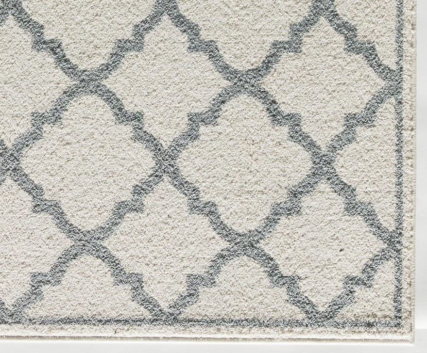 The appearance of Tyson DV20B Moroccan White Geometric Moroccan White 9' x 12' Area Rug designed by Rugs America in the moroccan interior design. This white piece of furniture  was selected by 1StopBedrooms from Tyson Collection to add a touch of cosiness and style into your home. Sku: RA27940. Material: Polypropylene. Product Type: Area Rugs. Image1