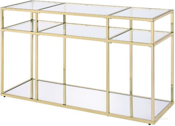 The appearance of Uchenna Sofa Table In Clear Glass And Gold designed by ACME in the modern / contemporary interior design. This gold piece of furniture  was selected by 1StopBedrooms from Uchenna Collection to add a touch of cosiness and style into your home. Sku: 83473. Material: Metal. Product Type: Sofa Table. Image1