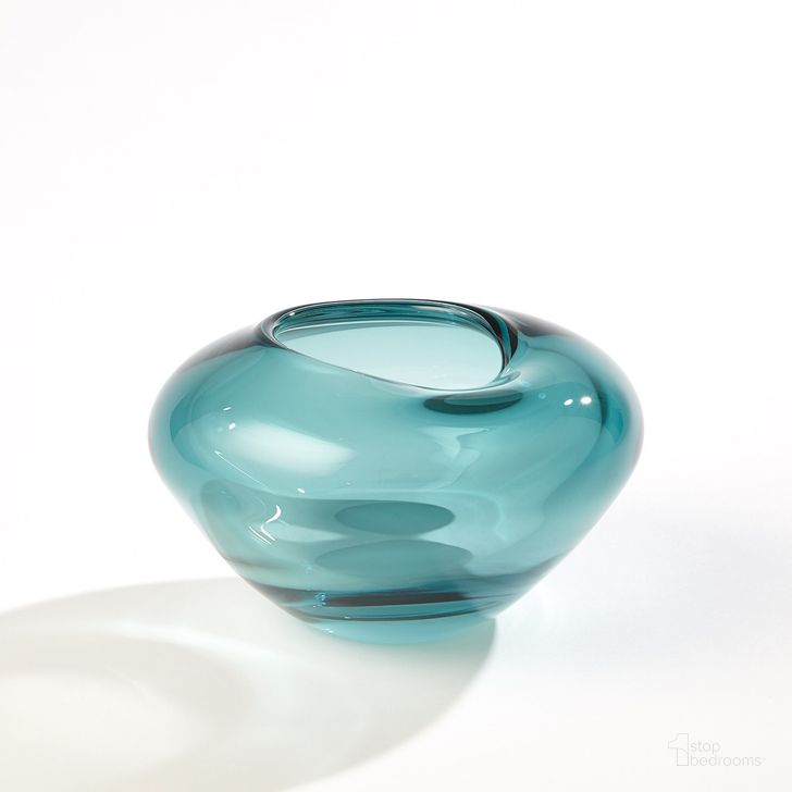 The appearance of Undulating Small Vase In Azure designed by Global Views in the modern / contemporary interior design. This blue piece of furniture  was selected by 1StopBedrooms from Undulating Collection to add a touch of cosiness and style into your home. Sku: 6.60554. Material: Glass. Product Type: Vase. Image1