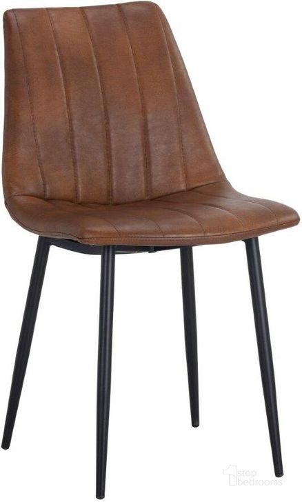 The appearance of Urban Unity Drew Black Bravo Cognac Dining Chair Set Of 2 designed by Sunpan in the transitional interior design. This brown piece of furniture  was selected by 1StopBedrooms from Urban Unity Collection to add a touch of cosiness and style into your home. Sku: 104963. Material: Faux Leather. Product Type: Dining Chair. Image1