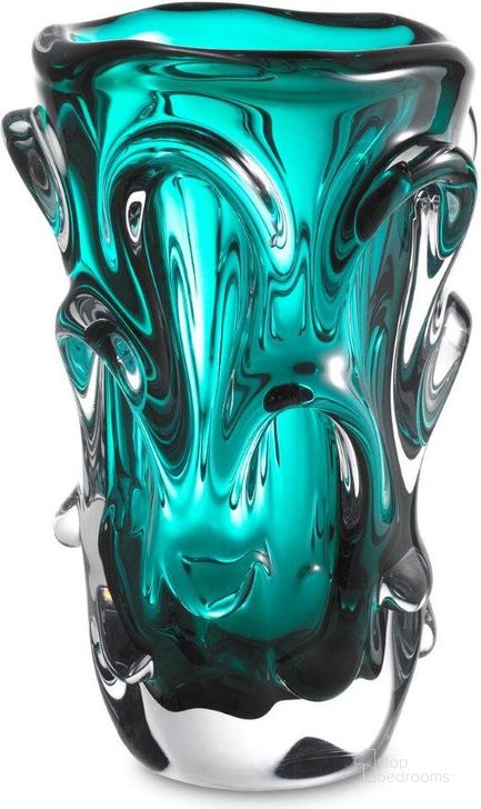 The appearance of Vase Aila L Turquoise designed by Eichholtz in the modern / contemporary interior design. This turquoise piece of furniture  was selected by 1StopBedrooms from Aila Collection to add a touch of cosiness and style into your home. Sku: 116170. Material: Glass. Product Type: Vase. Image1