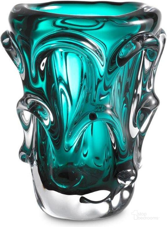 The appearance of Vase Aila S Turquoise designed by Eichholtz in the modern / contemporary interior design. This turquoise piece of furniture  was selected by 1StopBedrooms from Aila Collection to add a touch of cosiness and style into your home. Sku: 116171. Material: Glass. Product Type: Vase. Image1