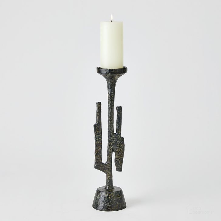 The appearance of Verde Large Candlestick In Bronze designed by Global Views in the modern / contemporary interior design. This bronze piece of furniture  was selected by 1StopBedrooms from Verde Collection to add a touch of cosiness and style into your home. Sku: 7.80701. Product Type: Candle Holder. Material: Iron. Image1