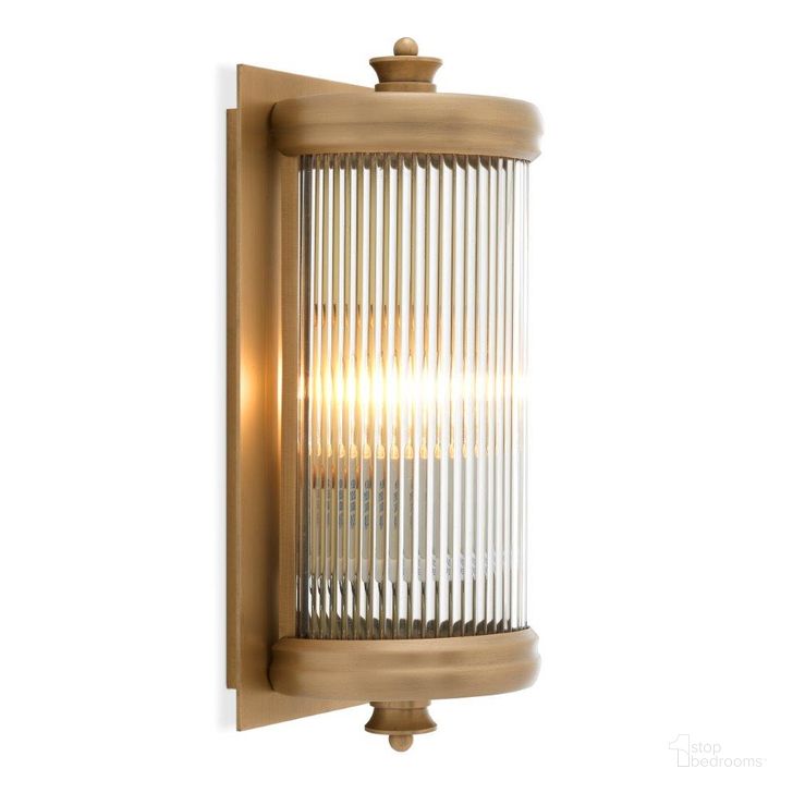 The appearance of Wall Lamp Glorious S Matte Brass Finish designed by Eichholtz in the modern / contemporary interior design. This brass piece of furniture  was selected by 1StopBedrooms from Glorious Collection to add a touch of cosiness and style into your home. Sku: 111523UL. Material: Glass. Product Type: Lamp. Image1