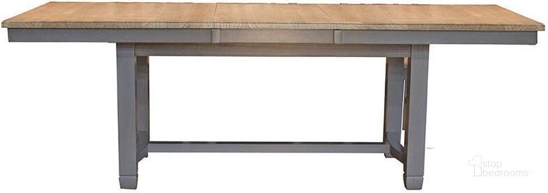 The appearance of Warren Grove Gray Dining Table 0qb2359009 designed by Isaac Tahari in the transitional interior design. This gray piece of furniture  was selected by 1StopBedrooms from Warren Grove Collection to add a touch of cosiness and style into your home. Sku: POTSP631B;POTSP631T. Table Base Style: Trestle. Product Type: Dining Table. Table Top Shape: Rectangular. Material: Pine. Size: 68". Image1