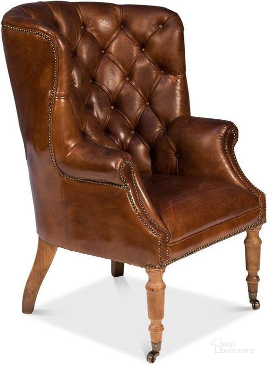 The appearance of Welsh Vintage Cigar Leather Chair designed by Sarreid in the traditional interior design. This vintage brown piece of furniture  was selected by 1StopBedrooms from Welsh Collection to add a touch of cosiness and style into your home. Sku: 40872. Product Type: Living Room Chair. Image1