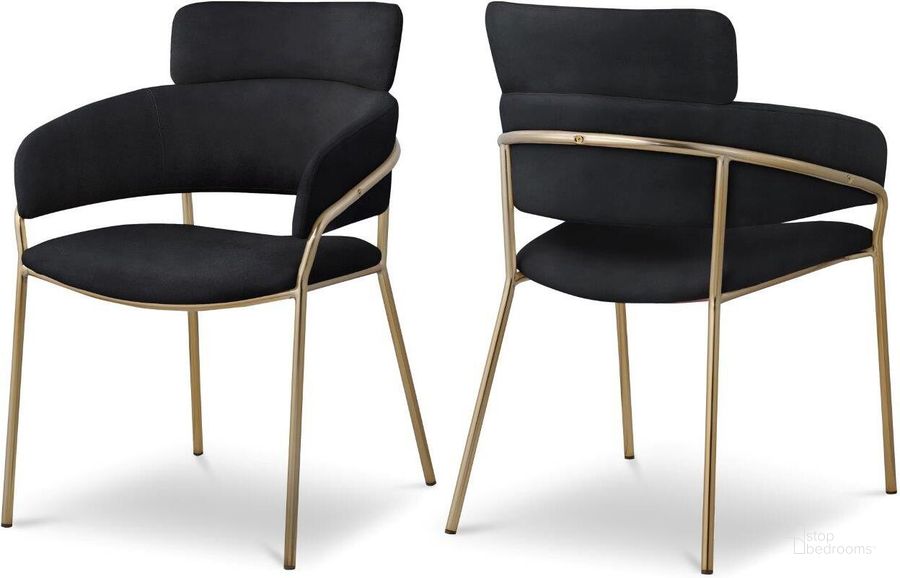 The appearance of Yara Black Velvet Dining Chair Set of 2 designed by Meridian in the modern / contemporary interior design. This black velvet piece of furniture  was selected by 1StopBedrooms from Yara Collection to add a touch of cosiness and style into your home. Sku: 549Black-C. Product Type: Dining Chair. Material: Iron. Image1