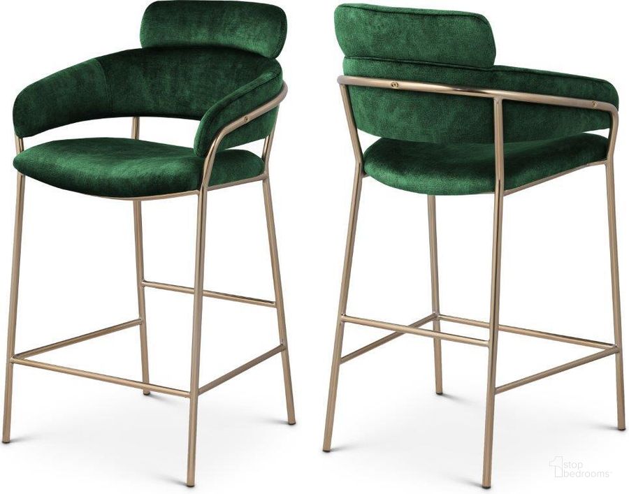 The appearance of Yara Green Velvet Bar Stool designed by Meridian in the modern / contemporary interior design. This green velvet piece of furniture  was selected by 1StopBedrooms from Yara Collection to add a touch of cosiness and style into your home. Sku: 550Green-C. Product Type: Barstool. Material: Iron. Image1