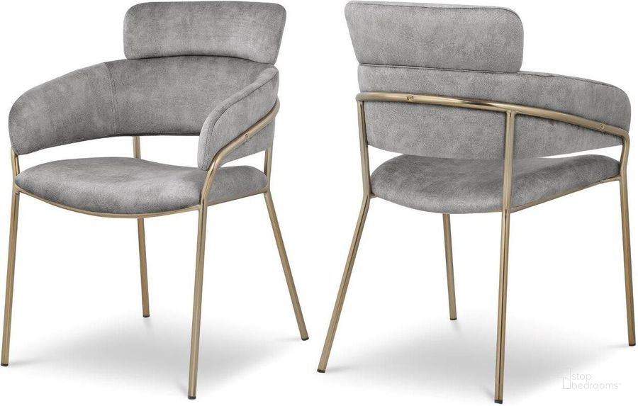The appearance of Yara Grey Velvet Dining Chair Set of 2 designed by Meridian in the modern / contemporary interior design. This grey velvet piece of furniture  was selected by 1StopBedrooms from Yara Collection to add a touch of cosiness and style into your home. Sku: 549Grey-C. Product Type: Dining Chair. Material: Iron. Image1