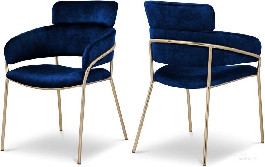 The appearance of Yara Navy Velvet Dining Chair Set of 2 designed by Meridian in the modern / contemporary interior design. This navy velvet piece of furniture  was selected by 1StopBedrooms from Yara Collection to add a touch of cosiness and style into your home. Sku: 549Navy-C. Product Type: Dining Chair. Material: Iron. Image1