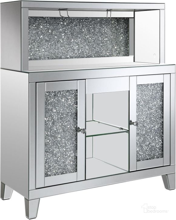 The appearance of Yvaine 2-Door Mirrored Wine Cabinet with Faux Crystal Inlay In Silver designed by Coaster in the glam interior design. This silver piece of furniture  was selected by 1StopBedrooms from Yvaine Collection to add a touch of cosiness and style into your home. Sku: 115585. Material: Glass. Product Type: Wine Cabinet. Image1