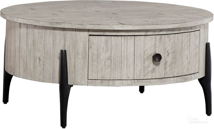 The appearance of Zane Round Cocktail Table In Grey designed by Aspenhome in the modern / contemporary interior design. This grey piece of furniture  was selected by 1StopBedrooms from Zane Collection to add a touch of cosiness and style into your home. Sku: I256-9101. Material: Wood. Product Type: Cocktail Table. Image1