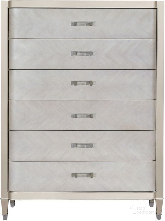 The appearance of Zoey 6 Drawer Chest In Silver designed by Pulaski in the modern / contemporary interior design. This silver piece of furniture  was selected by 1StopBedrooms from Zoey Collection to add a touch of cosiness and style into your home. Sku: P344124. Material: Wood. Product Type: Chest. Image1