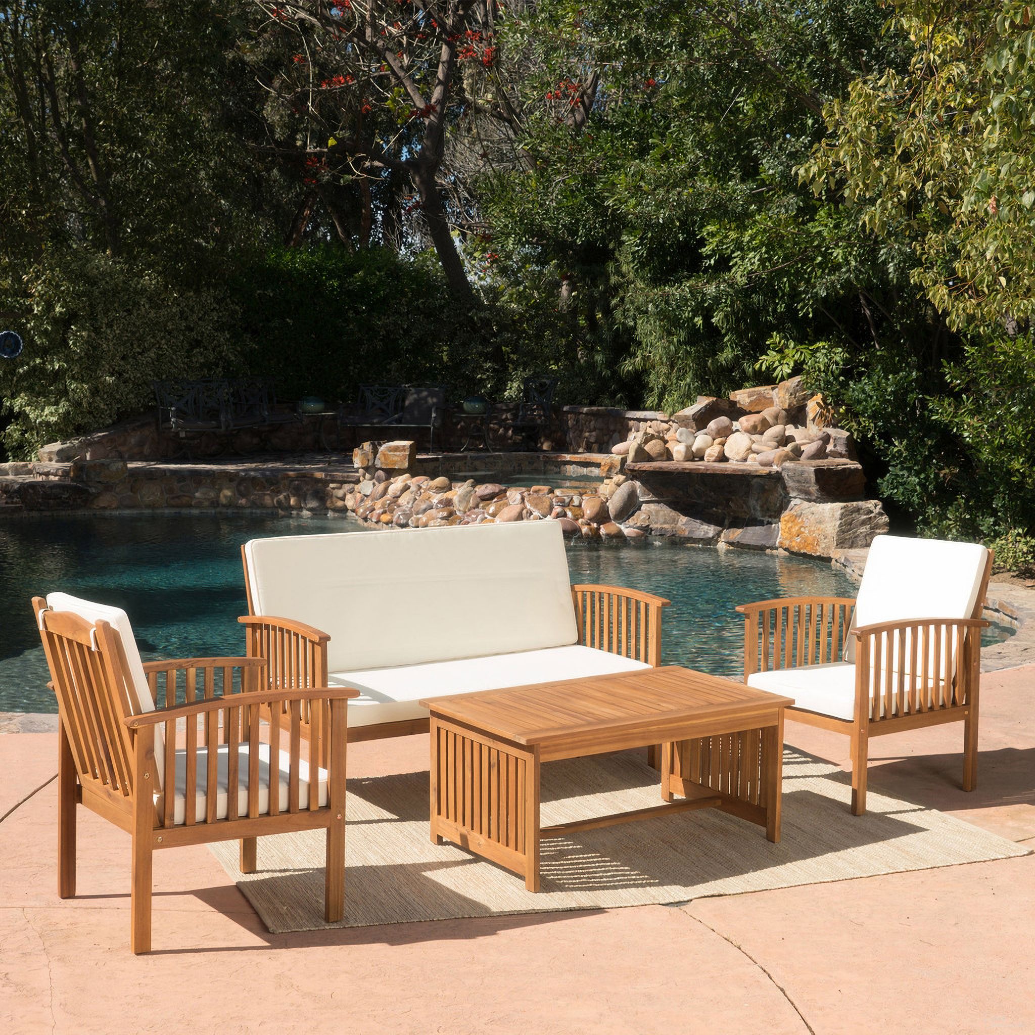 The appearance of 4-Piece Wooden Patio Set with Coffee Table, 2 Chairs and Loveseat In Beige designed by Noble House in the rustic / southwestern interior design. This beige piece of furniture was selected by 1StopBedrooms from to add a touch of cosiness and style into your home. Sku: 59116.00. Material: Velvet.