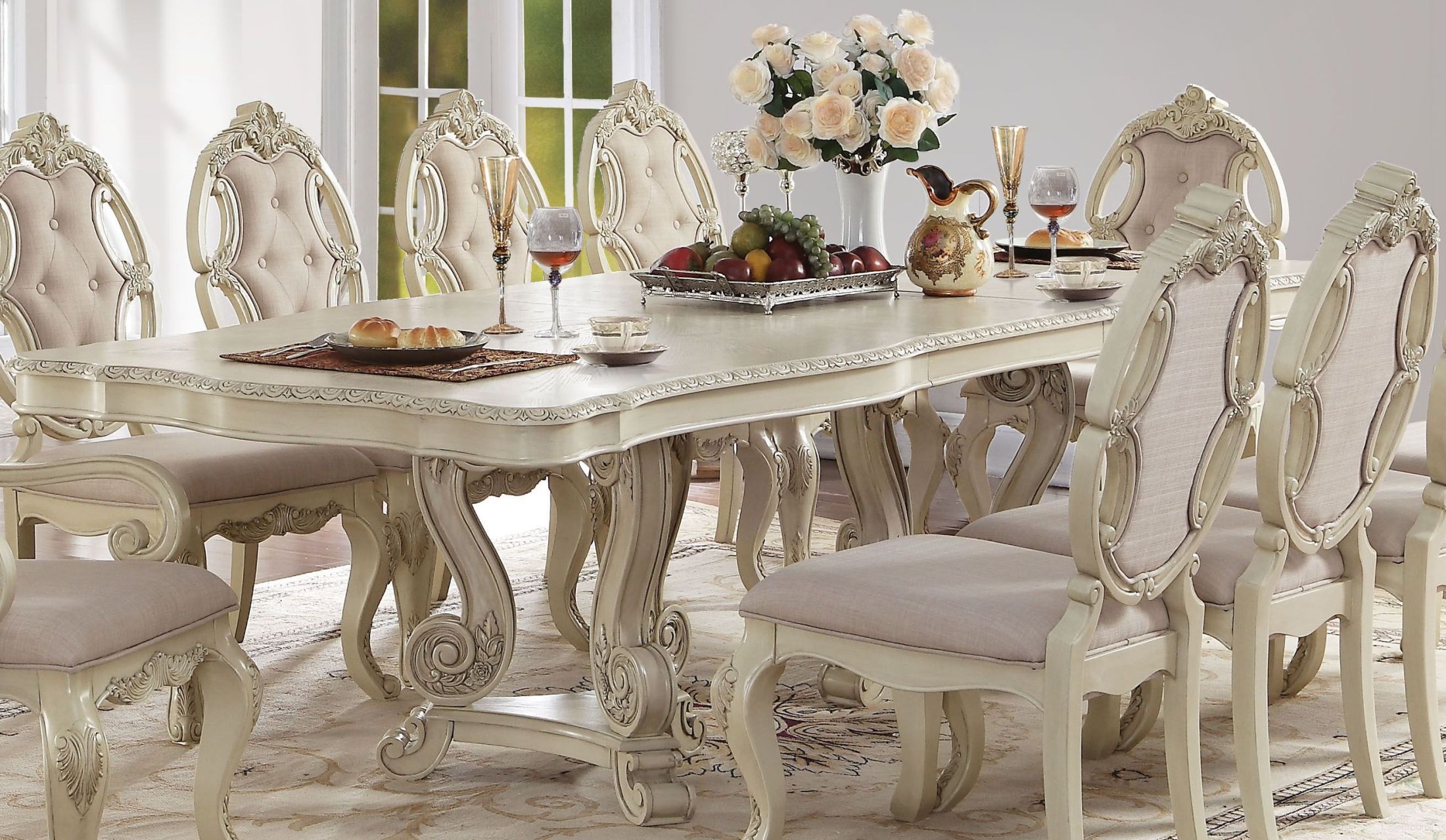 The appearance of Ragenardus Antique White Double Extendable Pedestal Dining Table designed by ACME in the rustic / southwestern interior design. This white piece of furniture was selected by 1StopBedrooms from Ragenardus Collection to add a touch of cosiness and style into your home. Sku: 61280T;61281ST. Table Base Style: Double Pedestal. Material: Wood. Table Top Shape: Rectangular. Size: 44" x 114".