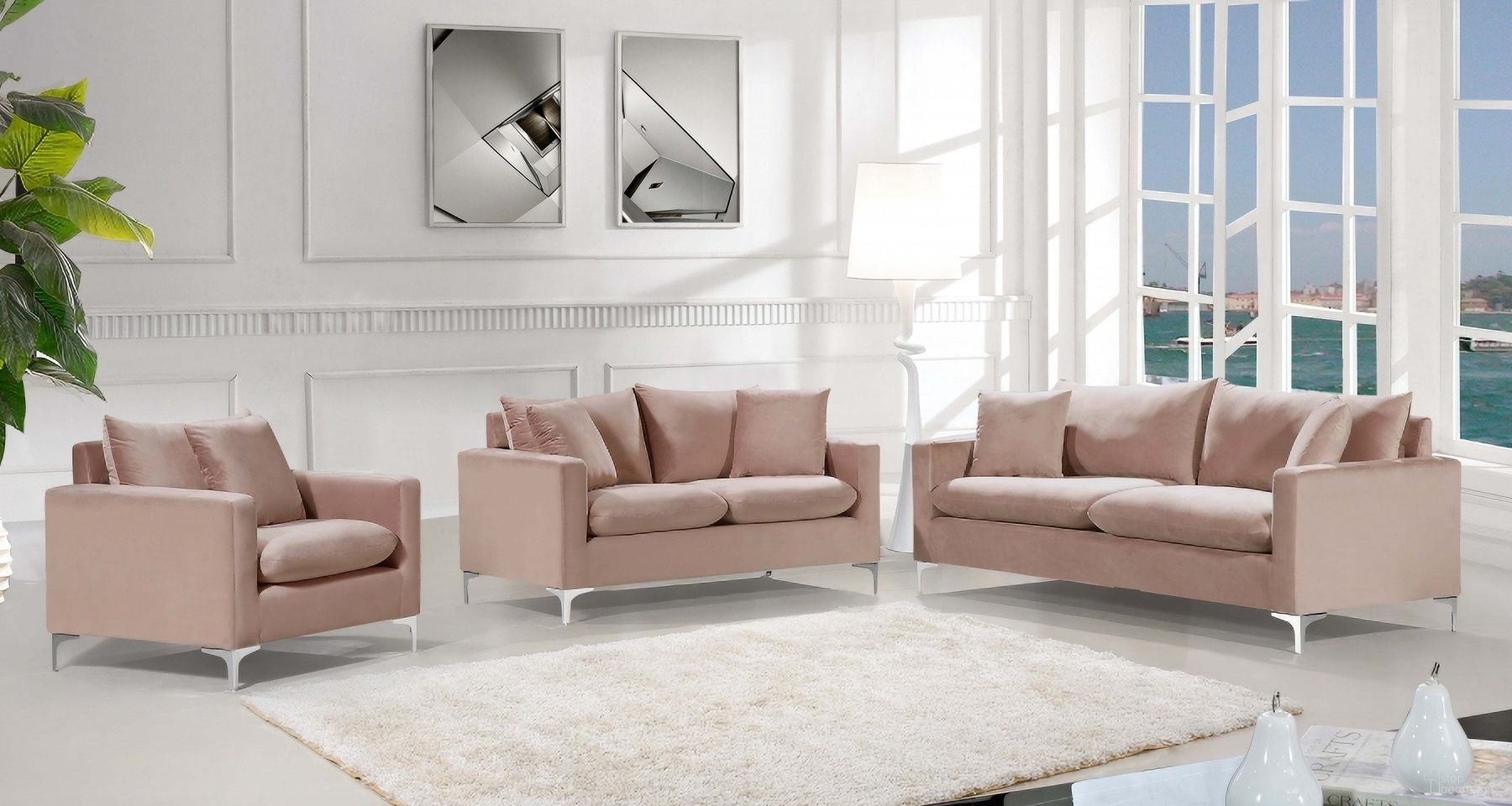 The appearance of Meridian Naomi 2 Piece Velvet Living Room Set In Pink designed by Meridian in the modern / contemporary interior design. This pink piece of furniture  was selected by 1StopBedrooms from Naomi Collection to add a touch of cosiness and style into your home. Sku: 633Pink-S;633Pink-L. Material: Velvet.