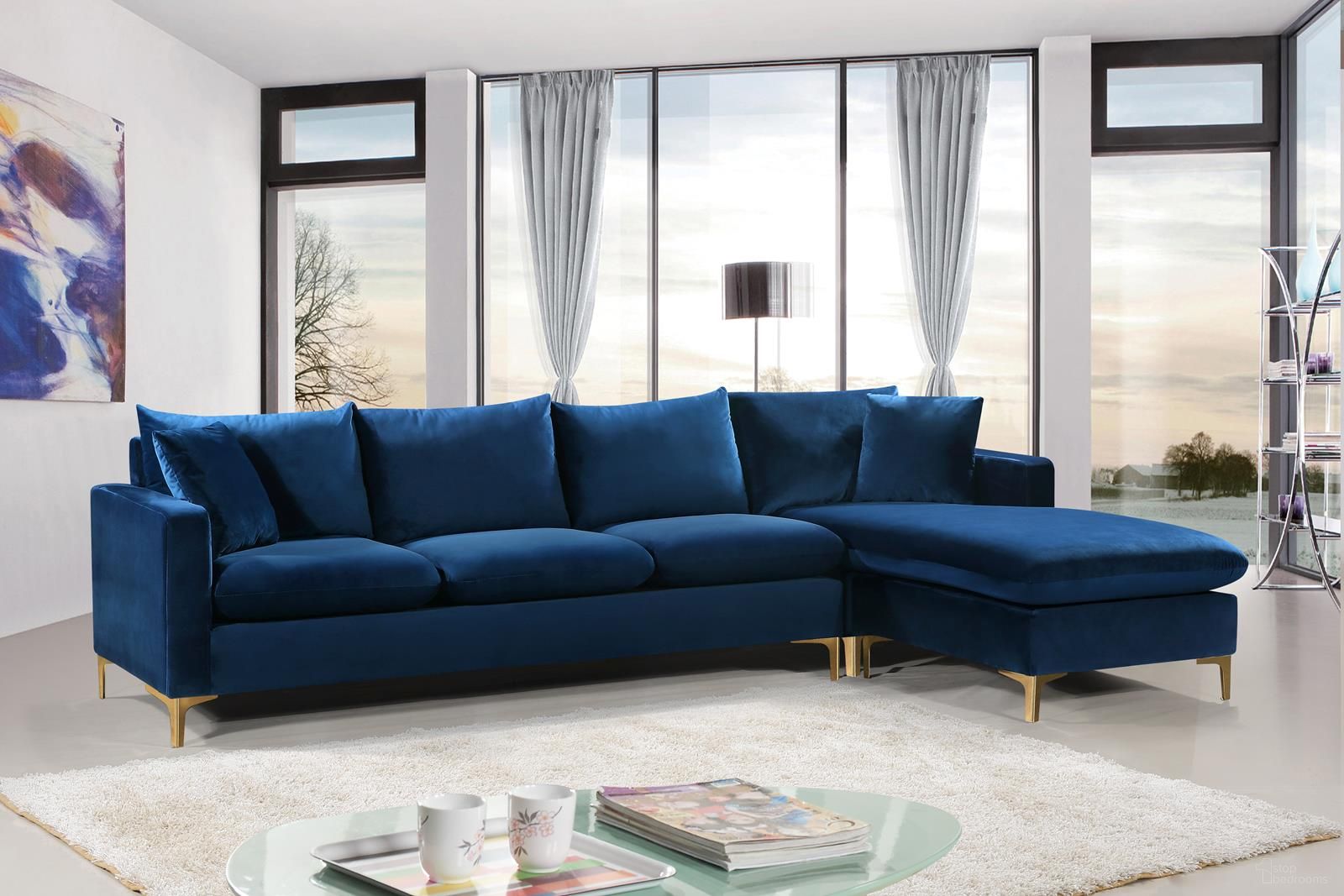 The appearance of Naomi 2-Piece Velvet Reversible Sectional In Navy designed by Meridian in the modern / contemporary interior design. This navy piece of furniture was selected by 1StopBedrooms from Naomi Collection to add a touch of cosiness and style into your home. Sku: 636Navy-Sectional Box 1/2 (Sofa Base + 3 Single Cushions + 4 Back Cushions + 9 Legs (4 Chrome + 1 Middle + 4 Gold);636Navy-Sectional Box 2/2 (Chair Base + Ott Base + Chaise Cushion + 2 Pillows + 16 Legs (8 Chrome + 8 Gold). Material: Velvet. Layout: Sofa & Chaise.
