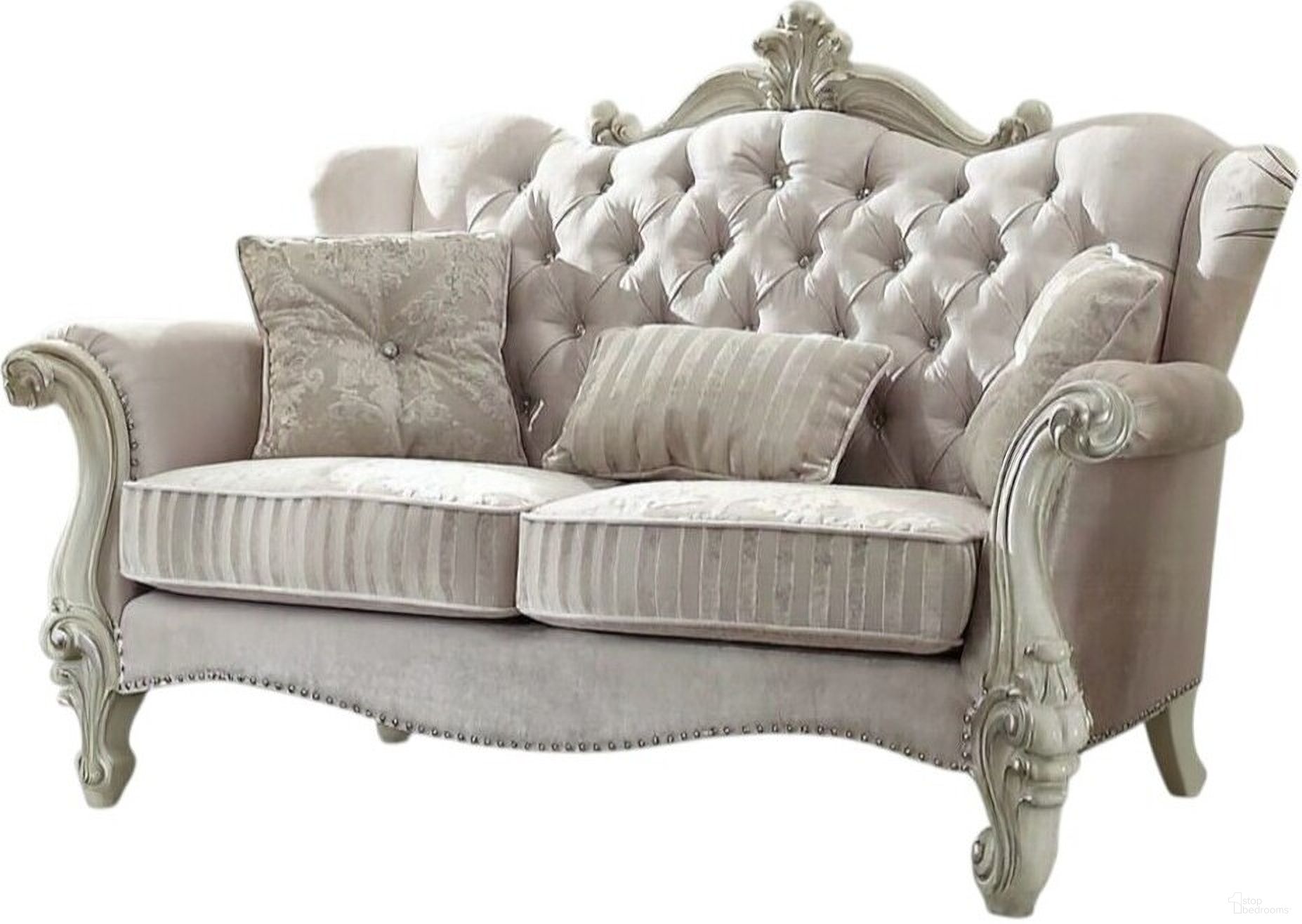 The appearance of 69 Inch Chesterfield Loveseat and Toss Pillows In Ivory designed by Homeroots in the traditional interior design. This ivory piece of furniture was selected by 1StopBedrooms from to add a touch of cosiness and style into your home. Sku: 374220. Material: Fabric.