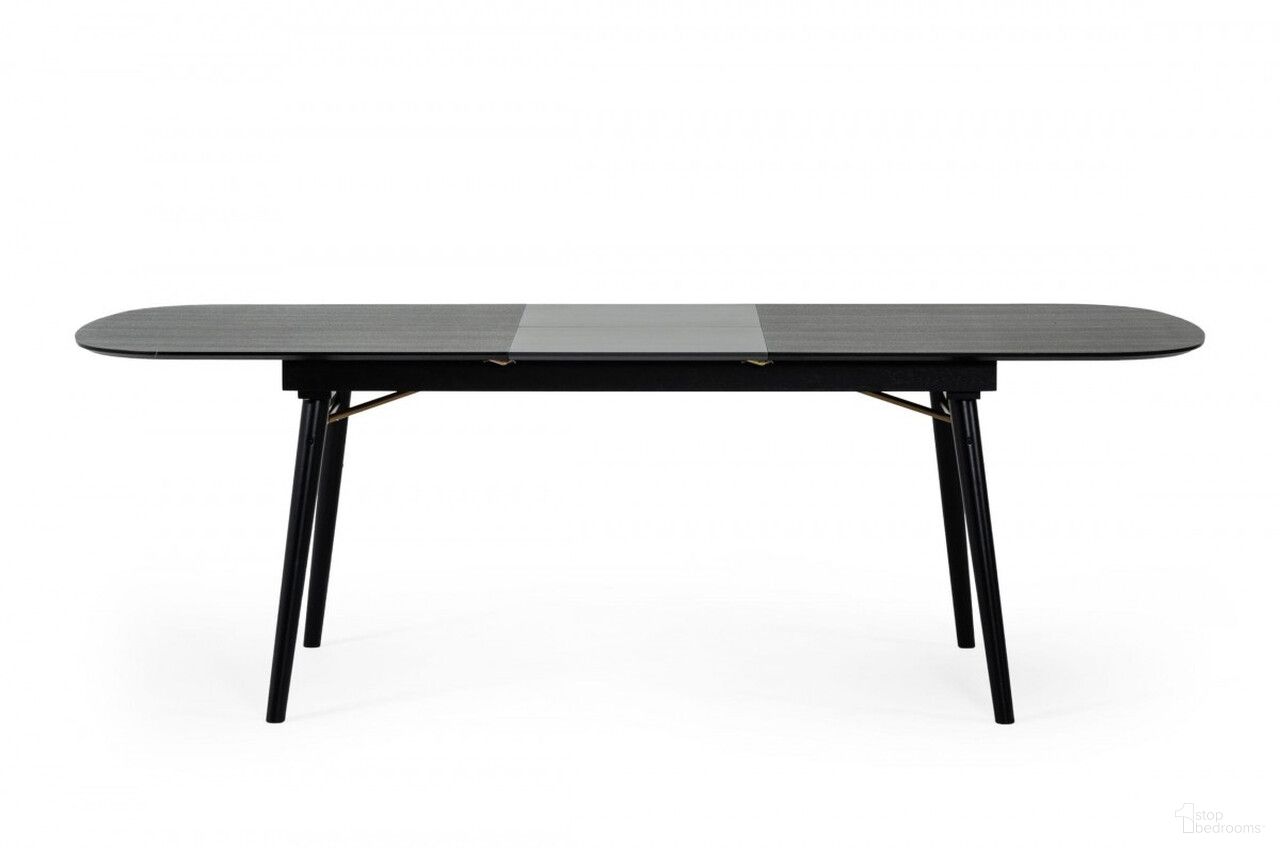 The appearance of 71 Inch Rectangular Manufactured Wood Butterfly Leaf Dining Table In Black designed by Homeroots in the modern / contemporary interior design. This black piece of furniture  was selected by 1StopBedrooms from  to add a touch of cosiness and style into your home. Sku: 486019. Table Base Style: Legs. Material: Wood. Table Top Shape: Rectangular. Size: 35" x 71".