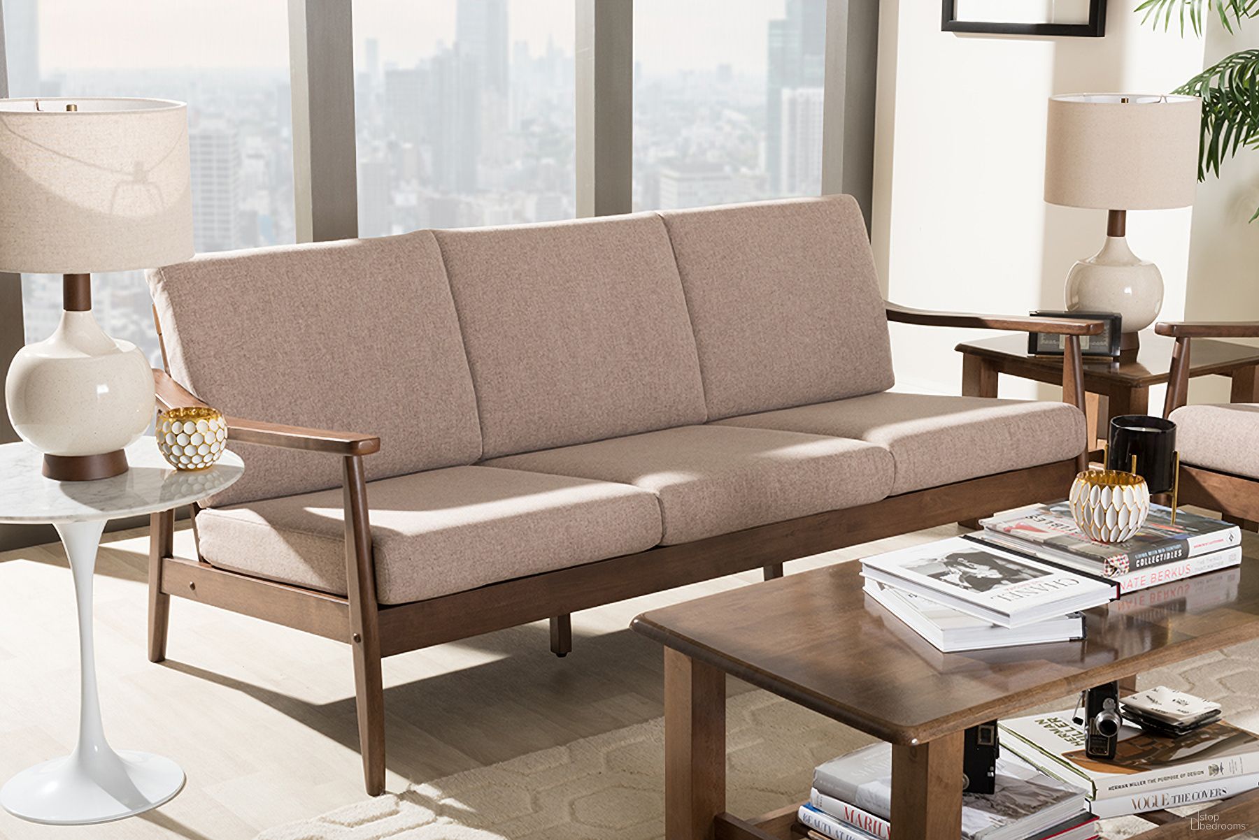 The appearance of Baxton Studio Venza Mid-Century Modern Walnut Wood Light Brown Fabric Upholstered 3-Seater Sofa designed by Baxton Studio in the transitional interior design. This light brown piece of furniture was selected by 1StopBedrooms from Venza Collection to add a touch of cosiness and style into your home. Sku: Venza-Brown/Walnut Brown-SF. Material: Polyester.