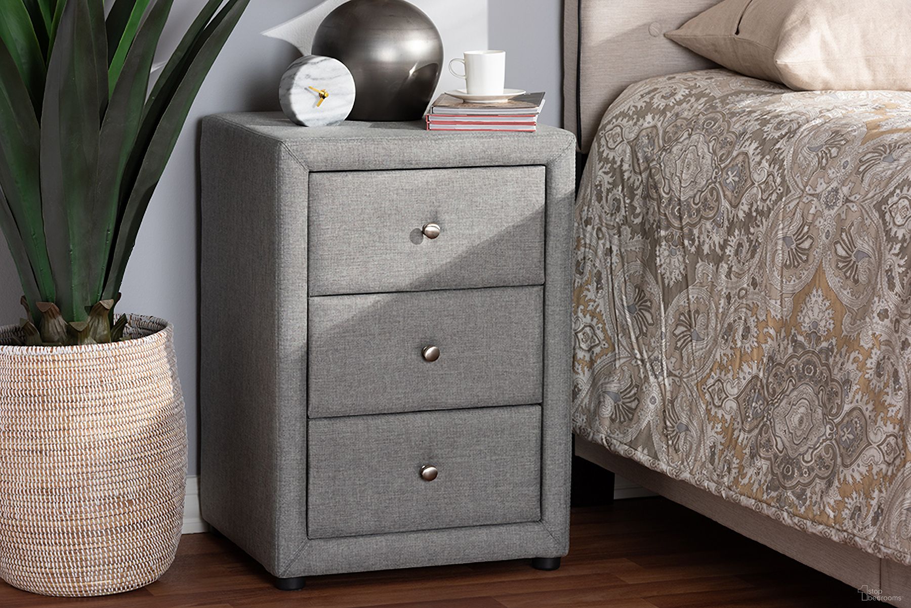 The appearance of Baxton Studio Tessa Modern And Contemporary Grey Fabric Upholstered 3-Drawer Nightstand designed by Baxton Studio in the modern / contemporary interior design. This grey piece of furniture  was selected by 1StopBedrooms from Tessa Collection to add a touch of cosiness and style into your home. Sku: BBT3138-Grey-NS. Material: Polyester.