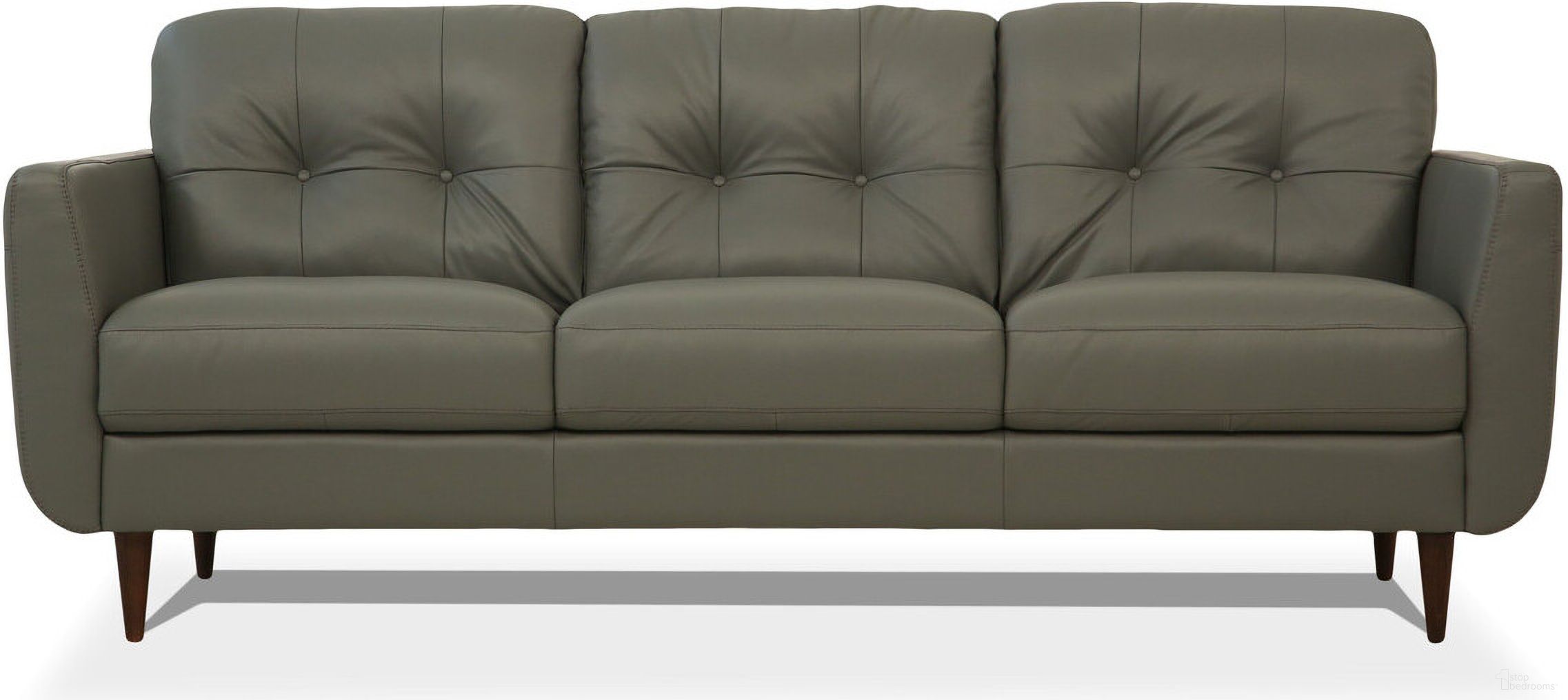 The appearance of 83 Inch Leather Sofa with Black Legs In Green designed by Homeroots in the modern / contemporary interior design. This green piece of furniture was selected by 1StopBedrooms from to add a touch of cosiness and style into your home. Sku: 491284. Material: Genuine Leather.