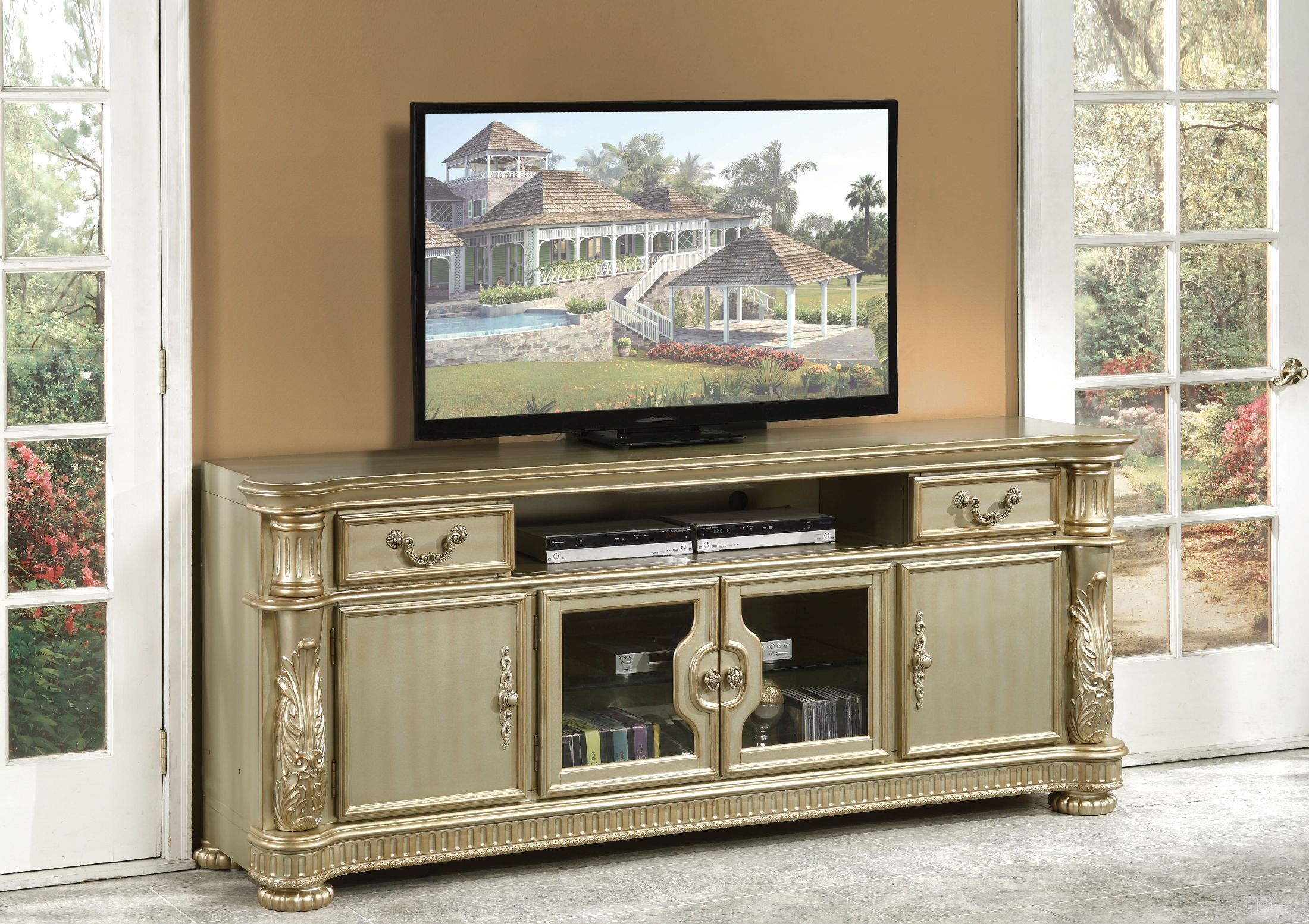 The appearance of Vendome Ii Gold Patina and Bone Tv Console designed by ACME in the rustic / southwestern interior design. This gold piece of furniture was selected by 1StopBedrooms from Vendome Ii Collection to add a touch of cosiness and style into your home. Sku: 91313. Material: Wood.
