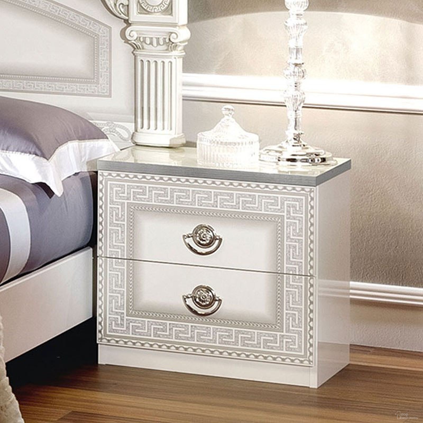 The appearance of Aida Nightstand (White and Silver) designed by ESF in the traditional interior design. This white piece of furniture  was selected by 1StopBedrooms from Aida Collection to add a touch of cosiness and style into your home. Sku: AIDANSWHITE. Material: MDF.
