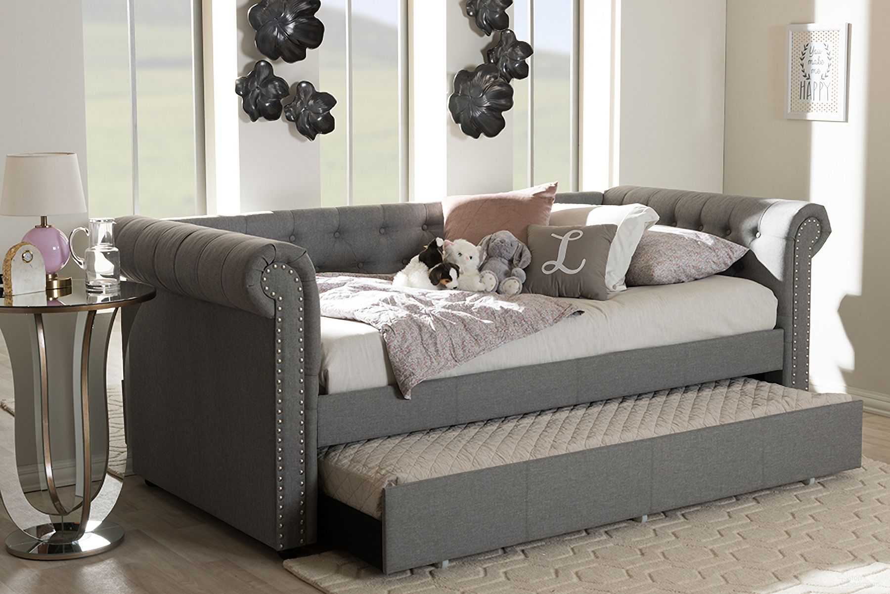 The appearance of Baxton Studio Mabelle Modern And Contemporary Grey Fabric Trundle Daybed designed by Baxton Studio in the modern / contemporary interior design. This grey piece of furniture was selected by 1StopBedrooms from Mabelle Collection to add a touch of cosiness and style into your home. Sku: Ashley-Grey-Daybed. Bed Type: Daybed. Material: Fabric. Bed Size: Twin.