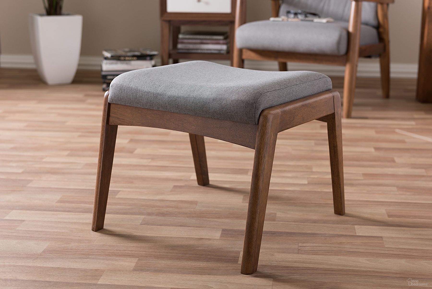 The appearance of Baxton Studio Roxy Mid-Century Modern Walnut Wood Finishing And Grey Fabric Upholstered Ottoman designed by Baxton Studio in the transitional interior design. This grey piece of furniture was selected by 1StopBedrooms from Roxy Collection to add a touch of cosiness and style into your home. Sku: BBT5266-Grey-Stool-XD45. Material: Fabric.