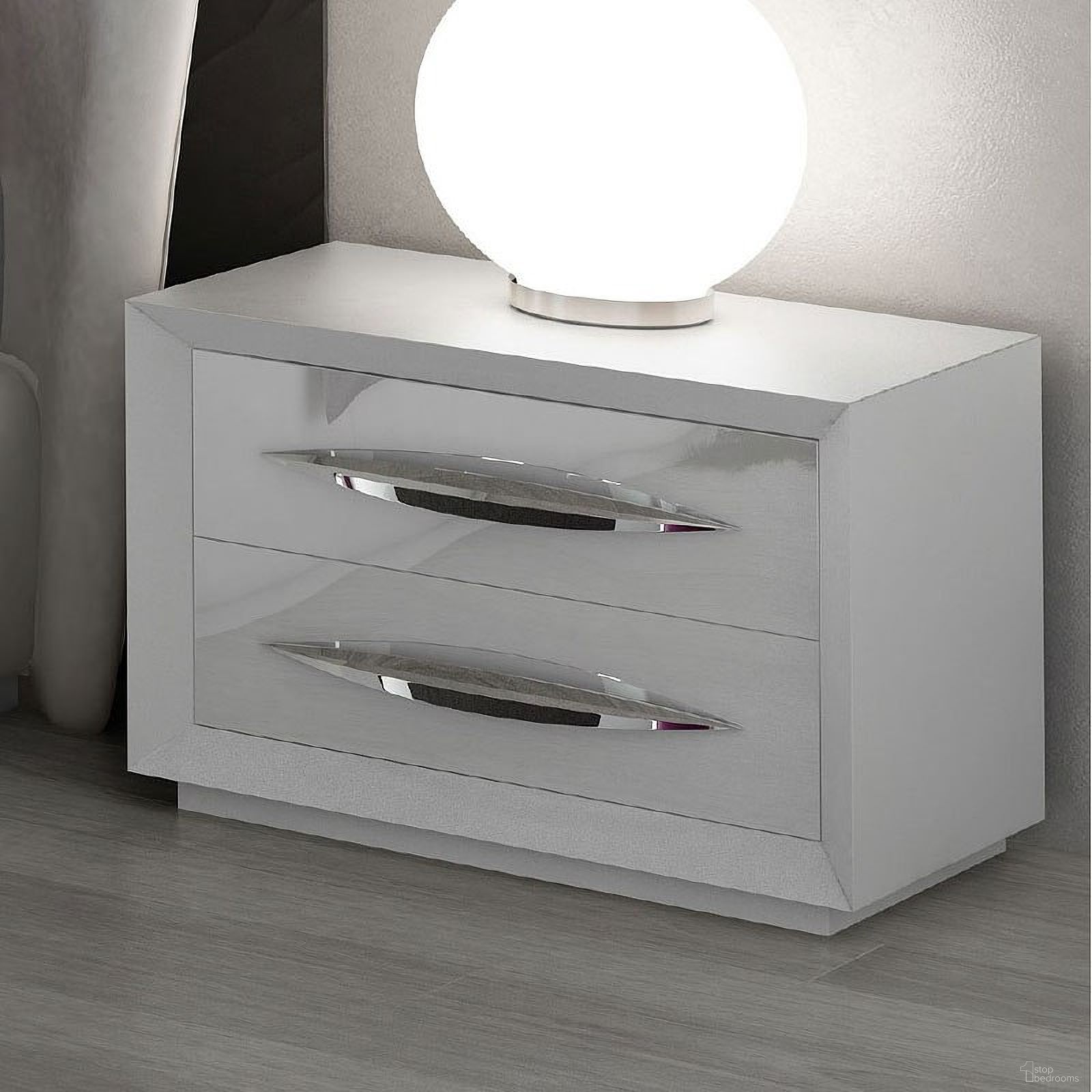 The appearance of Carmen Nightstand (White) designed by ESF in the modern / contemporary interior design. This white high gloss piece of furniture was selected by 1StopBedrooms from Carmen Collection to add a touch of cosiness and style into your home. Sku: CARMENN/SWHITE. Material: MDF.