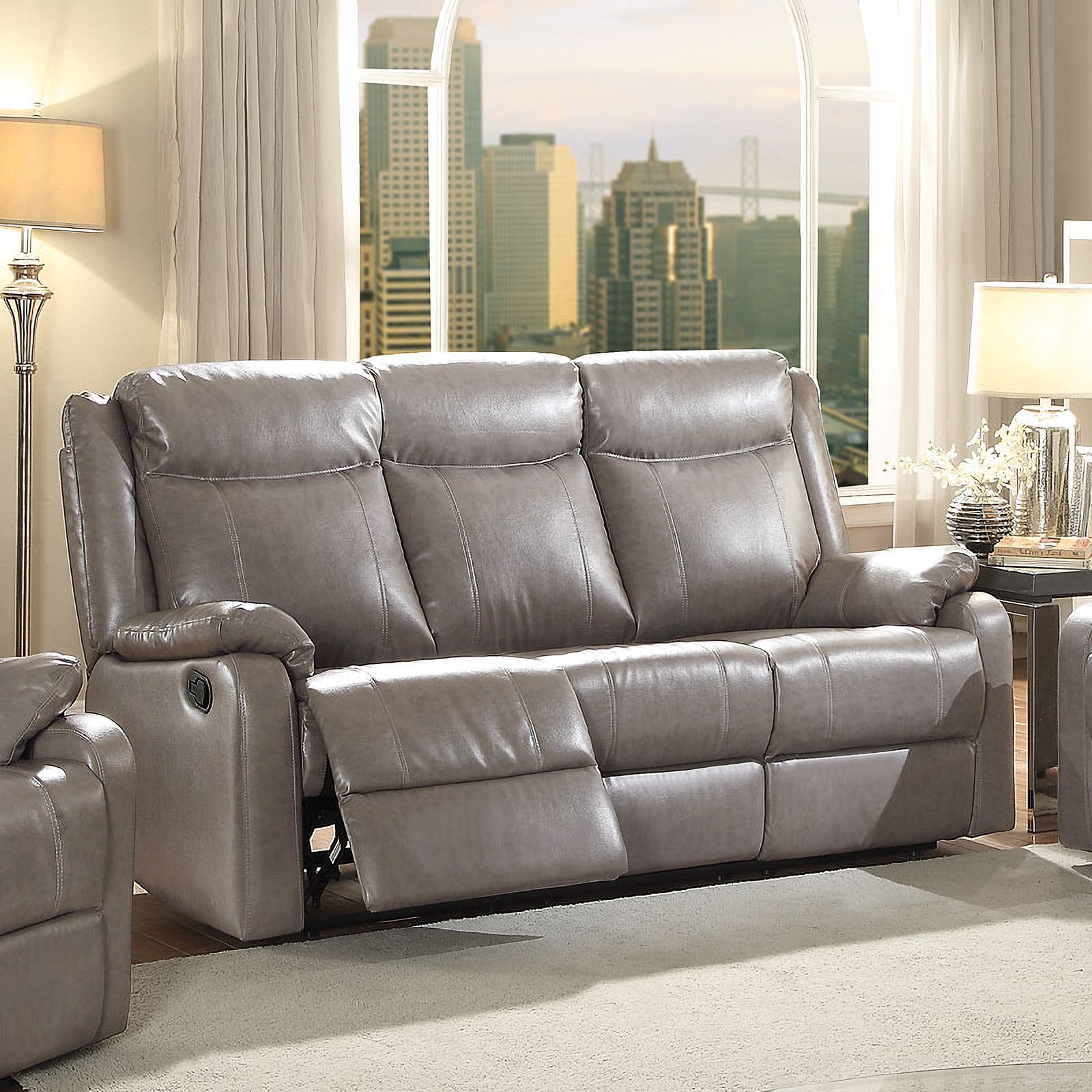 The appearance of G763 Double Reclining Sofa (Gray) designed by Glory in the modern / contemporary interior design. This gray piece of furniture was selected by 1StopBedrooms from G76 Collection to add a touch of cosiness and style into your home. Sku: G763A-RS-Double Reclining Sofa. Material: Faux Leather.