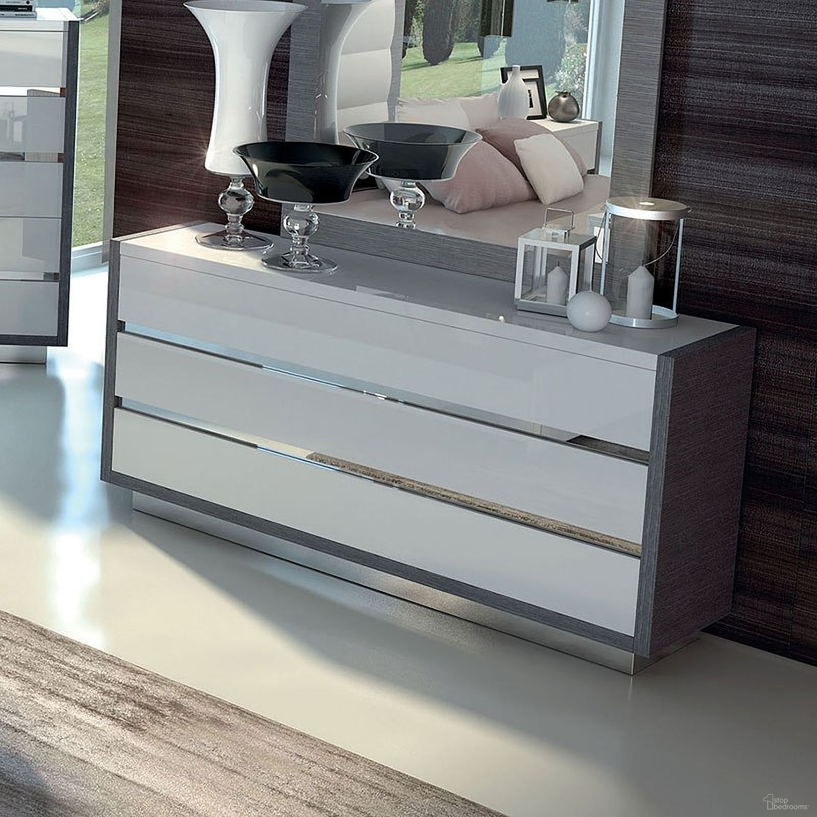 The appearance of Mangano Dresser designed by ESF in the modern / contemporary interior design. This gloss white piece of furniture was selected by 1StopBedrooms from Mangano Collection to add a touch of cosiness and style into your home. Sku: MANGANODRESSER. Material: MDF.