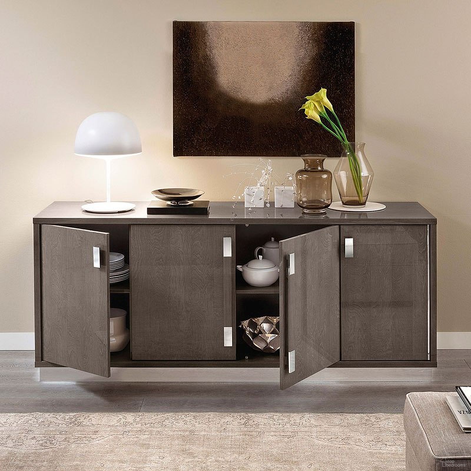 The appearance of Platinum Slim 4 Door Buffet designed by ESF in the modern / contemporary interior design. This brown piece of furniture  was selected by 1StopBedrooms from Platinum Collection to add a touch of cosiness and style into your home. Sku: PLATINUMBUFFET. Material: MDF.