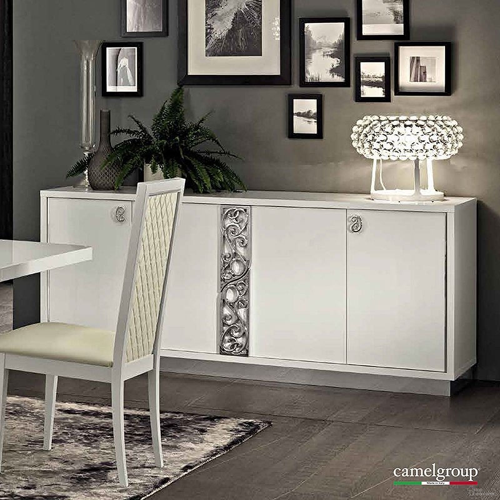 The appearance of Roma 4 Door Buffet (White) designed by ESF in the modern / contemporary interior design. This white piece of furniture was selected by 1StopBedrooms from Roma Collection to add a touch of cosiness and style into your home. Sku: ROMA4DBUFFETWHITE. Material: MDF.