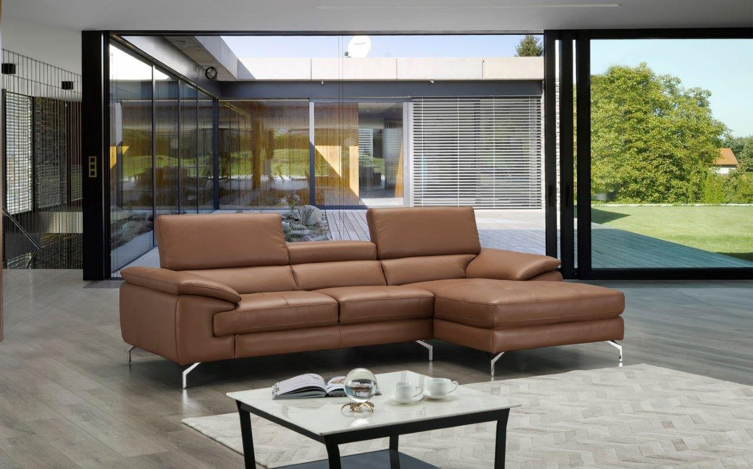 The appearance of A973B Italian Leather Mini Sectional Right Facing Chaise in Caramel designed by J&M in the modern / contemporary interior design. This caramel piece of furniture was selected by 1StopBedrooms from A973B Collection to add a touch of cosiness and style into your home. Sku: 17906122-RHFC. Material: Leather. Layout: Sofa & Chaise. Orientation: RAF.